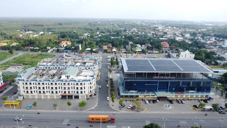 '''''''Aerial view of a city with buildings and trees

AI-generated content may be incorrect.'''''''